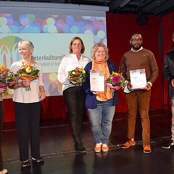 Gaelle Titinsnaider & Uta Bomme (FiD), Deo Amados & Yerima Halirou (A.T.F. e. V.), Sabine von Garßen & Irais Peisker (Müttercafé).