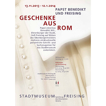 Plakat zur Ausstellung Geschenke von Papst Benedikt des XVI.