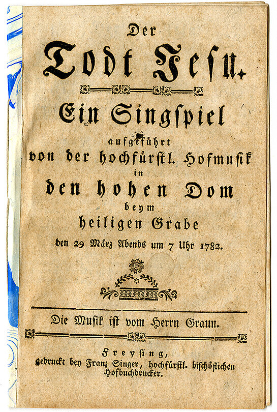 Deckblatt des Textheftes zur Aufführung von Carl Heinrich Grauns "Der Tod Jesu" im Freisinger Dom aus dem Jahr 1782.