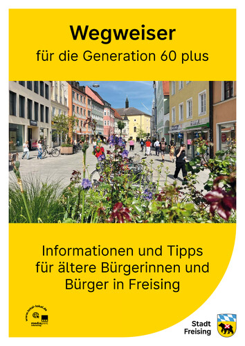 Bildaufnahme der Innestadt Freising, fotografiert aus der Perspektive hinter einem Blumenkübel